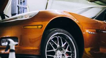Image of automobile in an auto repair shop