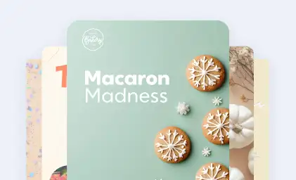 Mint green card showing "Macaron Madness" with decorated snowflake cookies and pumpkins on the right side.
