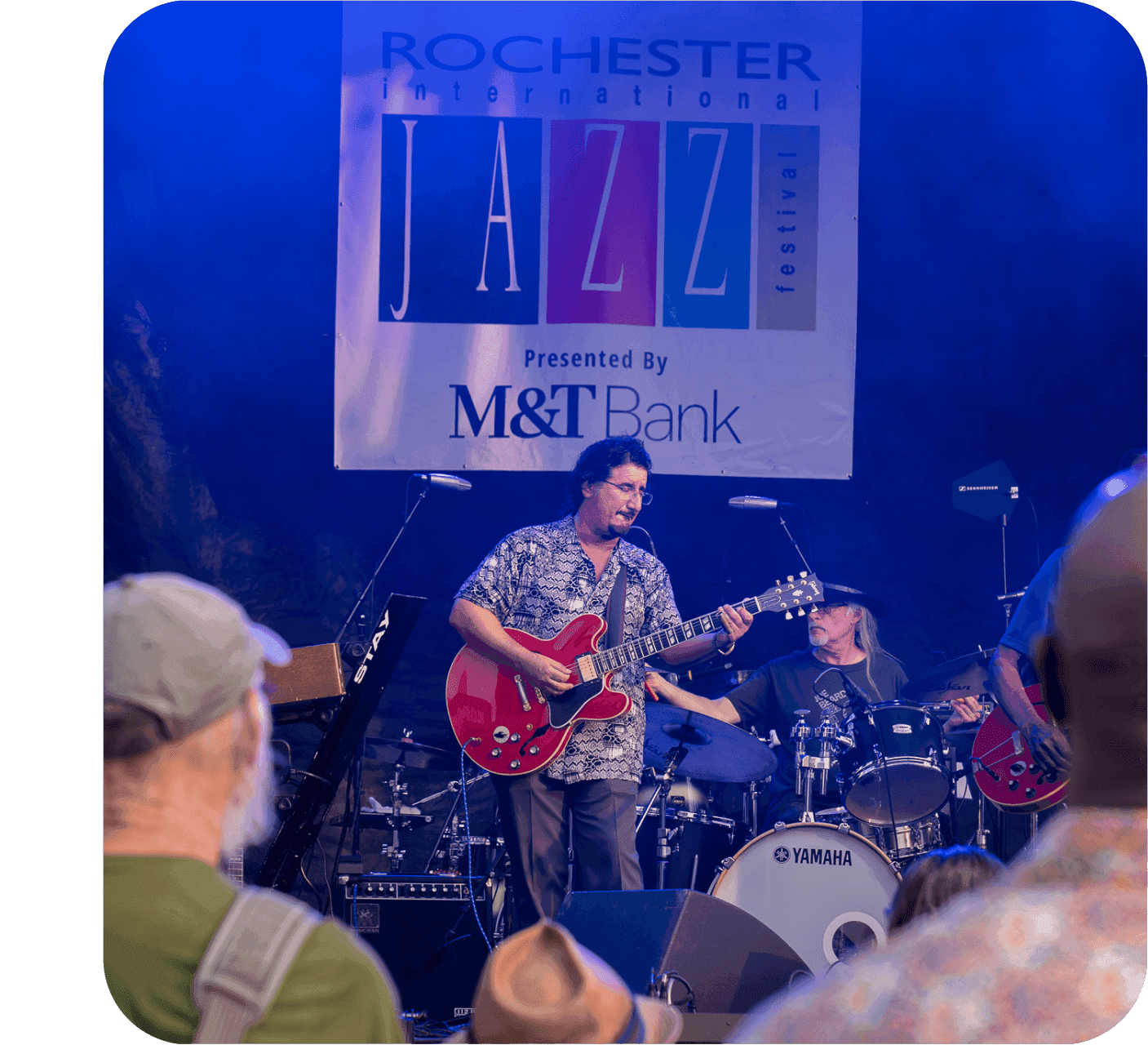 A musician playing at Rochester International Jazz Festival