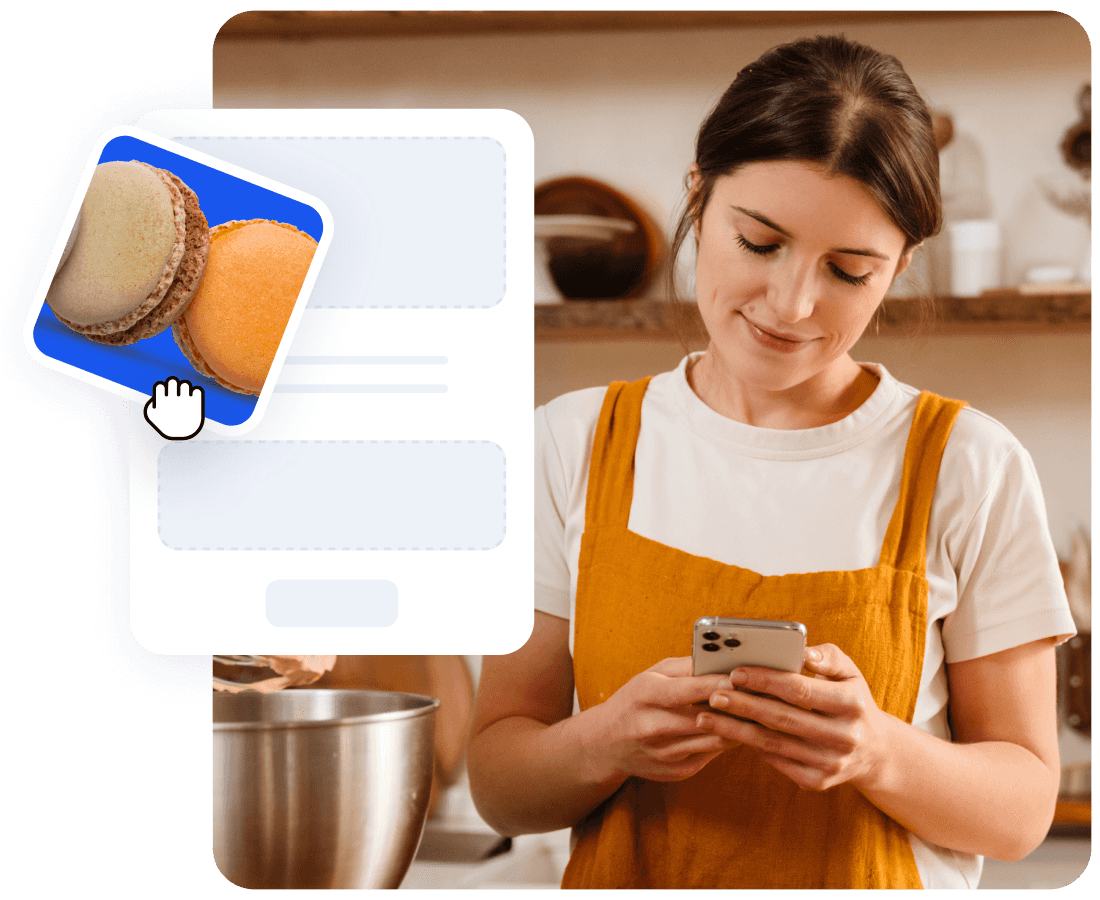 Person in orange apron using smartphone in kitchen with cooking pot visible and digital interface element.