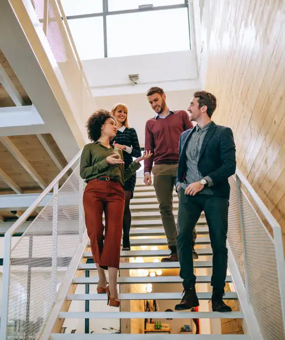 Partners walking down a staircase