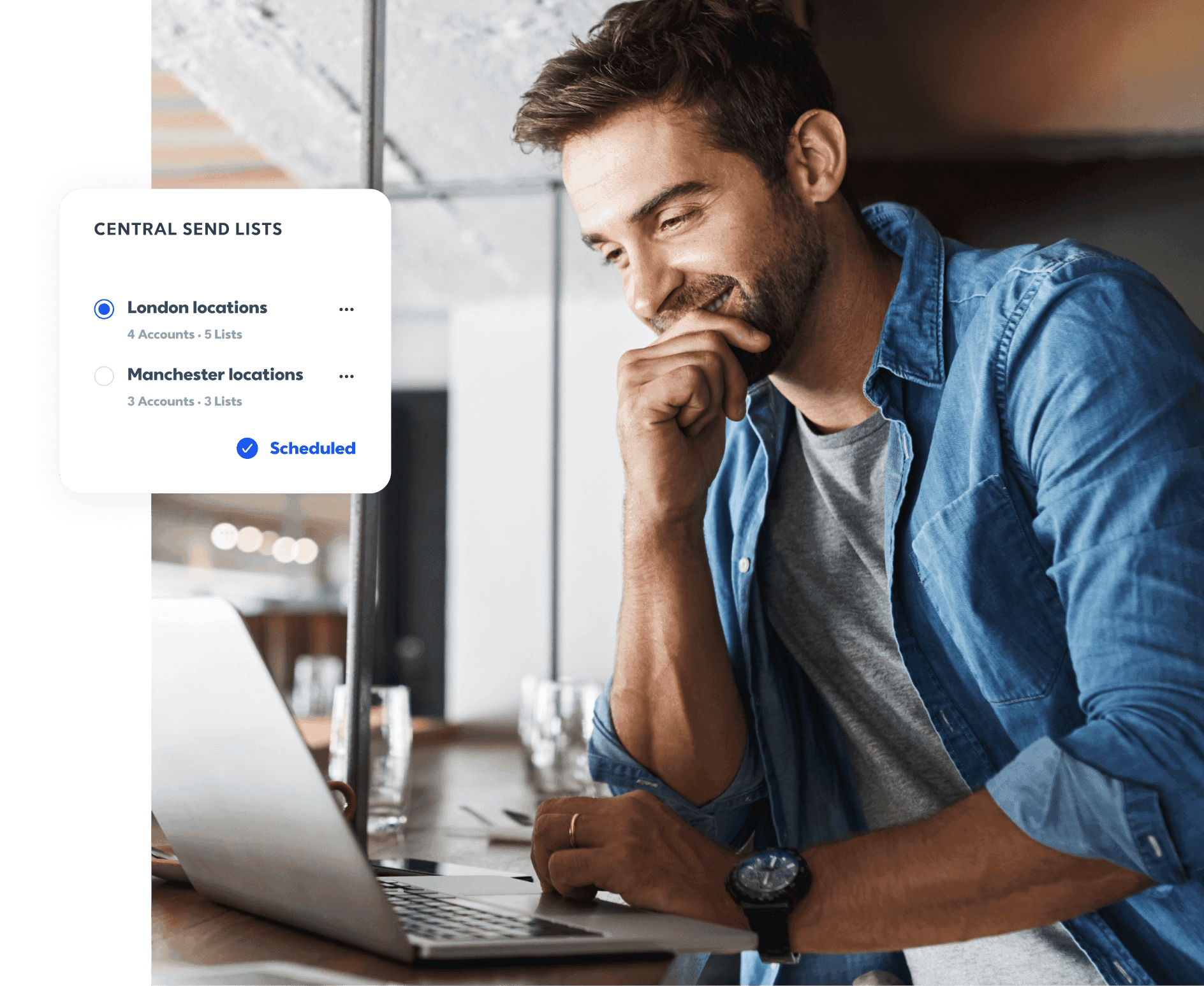 Male business owner looking at laptop with Central Sends screen example