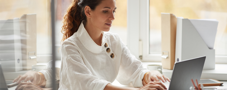 Add button to email blog header Business woman adding buttons to emails