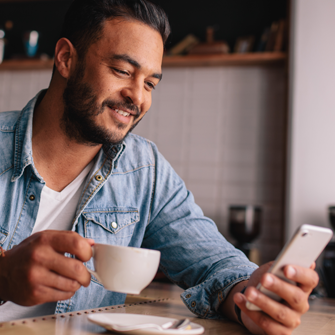 Man on phone with coffee cup thumbnail image