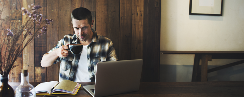 business owner with cup of coffee