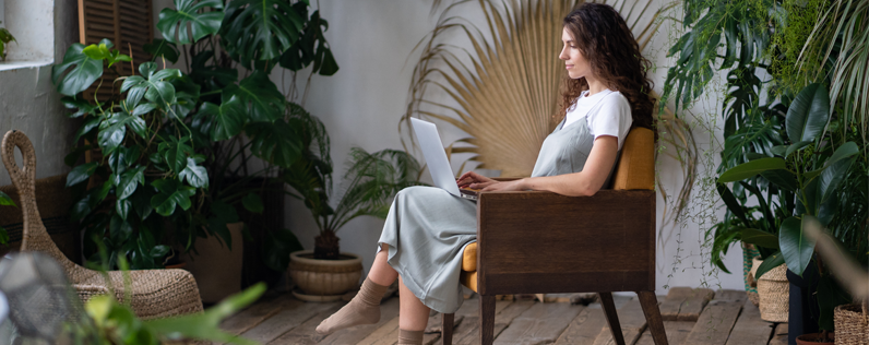 Make it easier to ready your emails blog header Female business owner on laptop