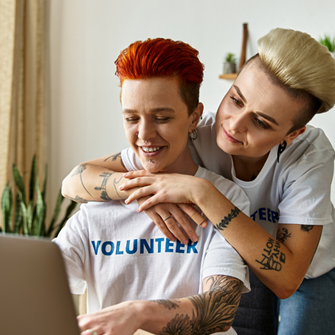 Nonprofit volunteers on laptop