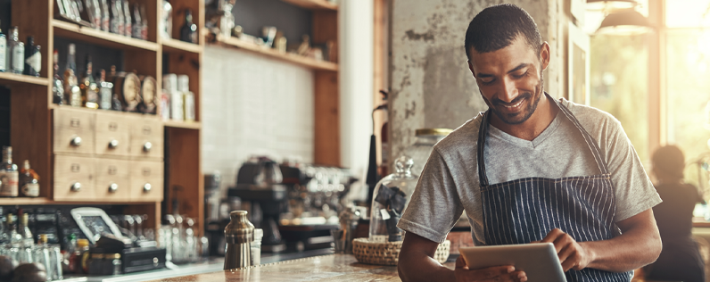 Restaurant owner working on email marketing