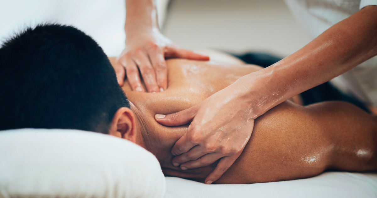 Male Massager Therapist Doing Therapeutic Back Massage Ot Client