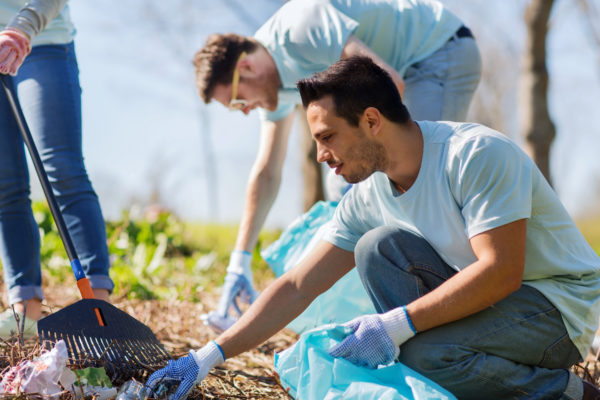 How to Get Clients For Private Duty Home Care -- Volunteer -- Volunteers cleaning up trash in a park