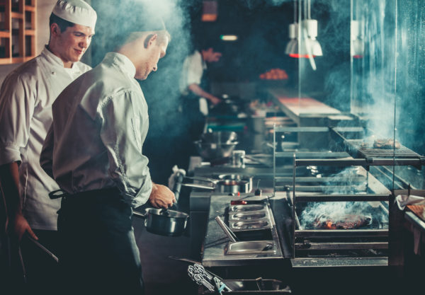 chefs preparing beef