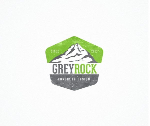 Image of a mountain or large rock in grey with company name, lower half in grey and the "skyline" in green