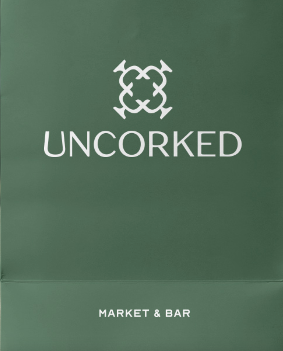 Uncorked's logo is one example of a brand with a simple logo using a shape.