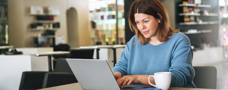 Gated content featured image Woman working on gated content for a small business