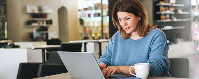 Woman working on gated content for a small business