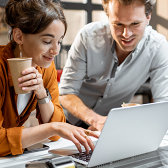 Shop owners working on Facebook business page