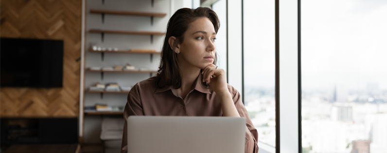 How to send mass email in gmail blog header Business owner sitting at desk working on sending mass email in gmail