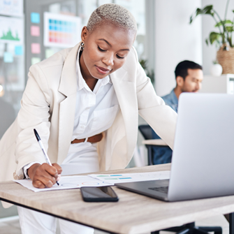 Business woman working on designing an email campaign