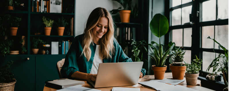 Account-based Marketing (ABM) Blog header Business woman working on laptop