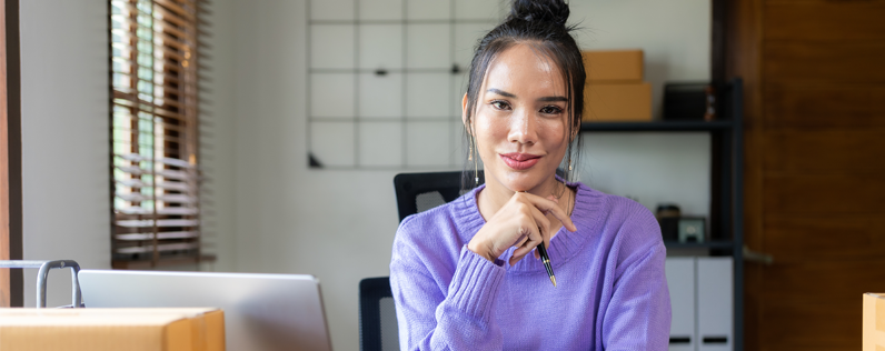Email Marketing Leads Blog Header Business owner at desk