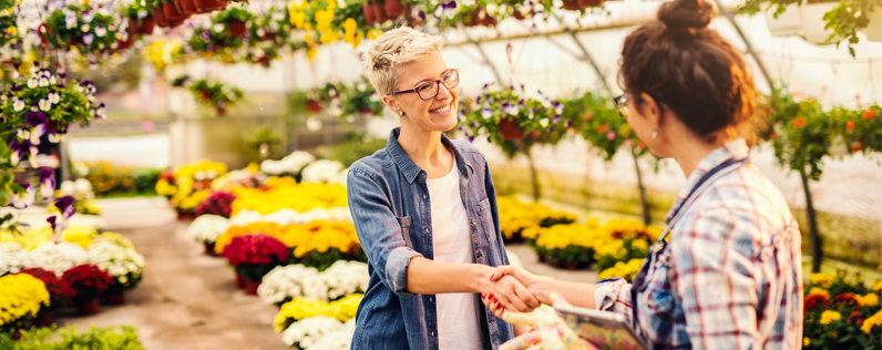 Loyalty Program Blog header Nursery owner shaking hands with customer