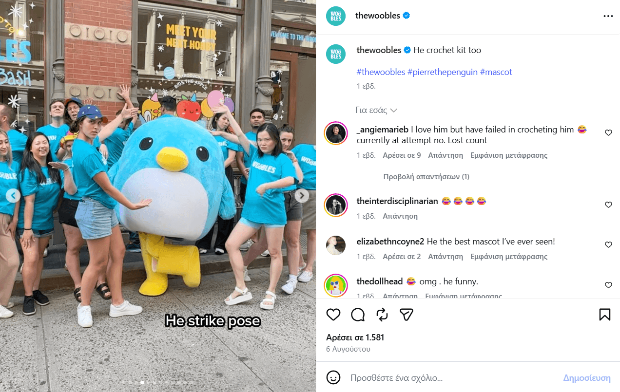 A screenshot of an Instagram post by The Woobles showing company team members in matching blue t-shirts posing alongside their Pierre the Penguin mascot