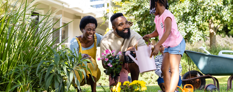 June holidays and newsletter ideas Blog header African American family in garden