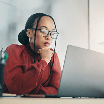 Female marketer on laptop