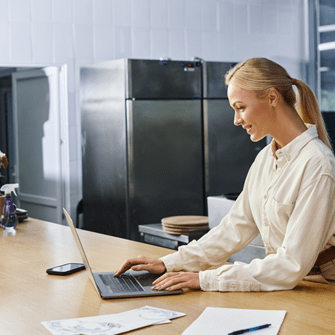 Female business owner on laptop