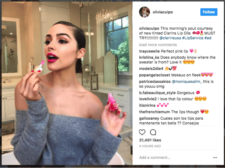 Social Media influencer Olivia Culpo is promoting a Clarins lip color