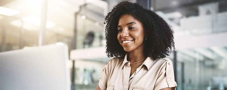 Fun subject lines header Black woman working on laptop craft a fun subject line