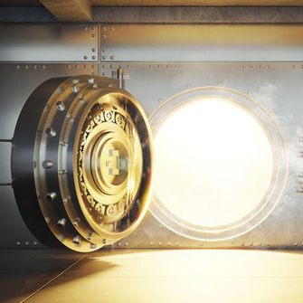 A close-in shot of a vault door cracked open.