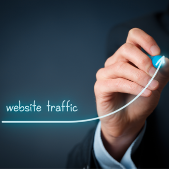Man drawing an upward arrow with the words "website traffic"