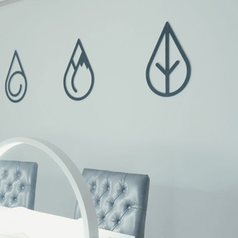 A tight shot of a spa interior with gray and black decor
