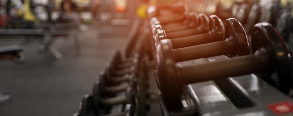 A thumbnail image showing a rack of free weights