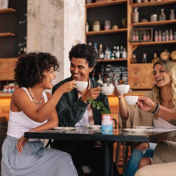 group of people having coffee at a cafe
