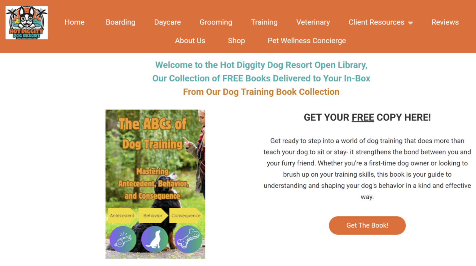 Screenshot of the Hot Diggity Dog Resort webpage offering a free ebook titled "The ABCs of Dog Training" with a description and a "Get The Book!" button