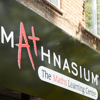 Mathnasium logo, red and white on a black background with a stylized A+