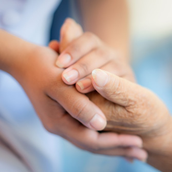 Two hands holding