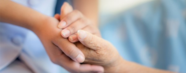 Two hands holding