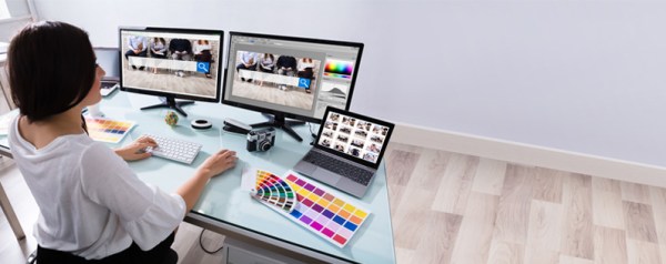 A woman working on a website design project.