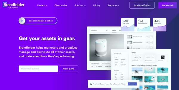 Brandfolder digital asset management homepage showing an asset library interface, usage analytics for views, downloads, and shares, and a notification about assets approaching expiration.